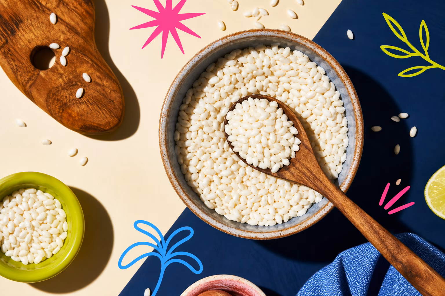 Close-up of arborio rice grains with a wooden spoon